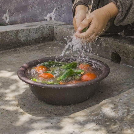 Washing vegetables in rural Tajikistan