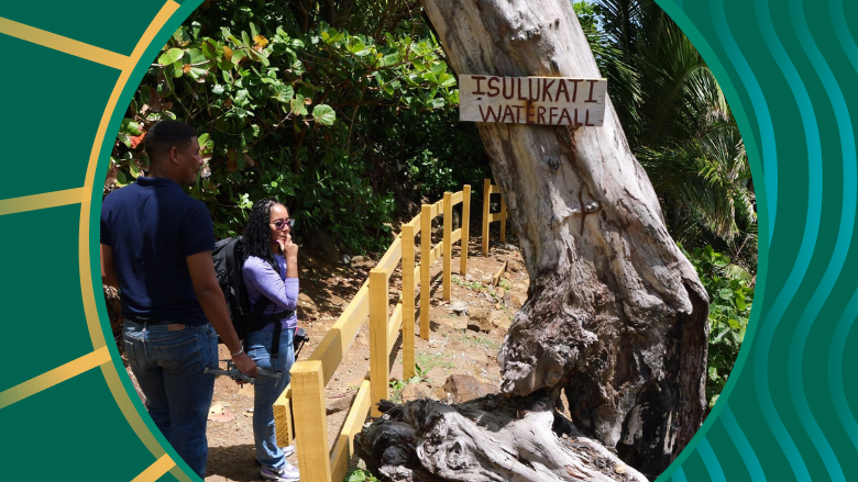 Tourists in Dominica near waterfall