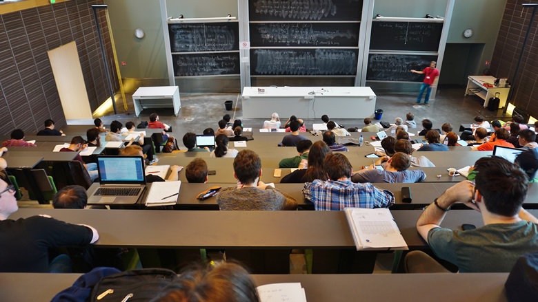 Students sitting in a lecture hall in Paris, France