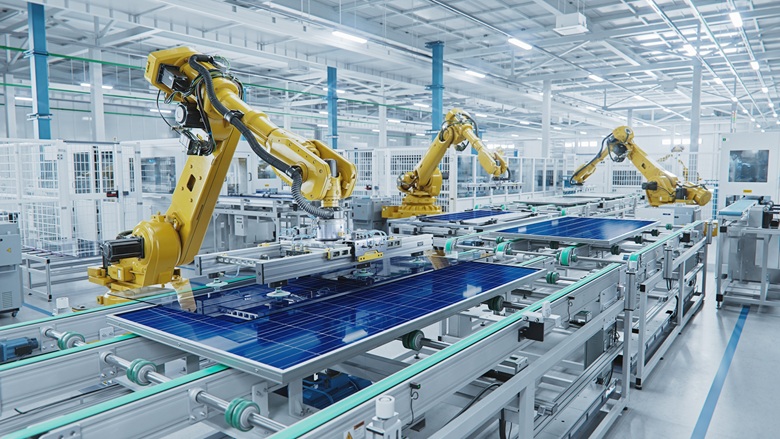 Industrial robot arms on a manufacturing production line